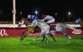 Arnaud De Lepine guides Jenkille Hipolyte towards the finish line to win Al Arish Cup. PIC: JUHAIM/QREC