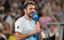 Switzerland's Stan Wawrinka gives an interview after losing to USA's Taylor Fritz in their men's singles match in Melbourne on January 24, 2026. (Photo by Paul Crock / AFP)