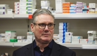 Britain's Prime Minister Keir Starmer pays a visit to a pharmacy at the Nelson Medical Practice health centre in Wimbledon, southwest London on January 26, 2026. (Photo by Adrian Dennis / Pool / AFP)