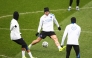 PSG’s Illia Zabarnyi (centre) controls the ball during a training session at the Campus Paris Saint-Germain in Poissy, yesterday. 