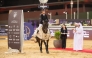 Kristen Vanderveen celebrates with her 12-year-old gelding Bull Run’s Jireh after winning the CSI5* jump-off 155cm class during the final round of the HH The Father Amir’s Prix at Al Shaqab yesterday. The winners of the class were presented trophies by Abdullah al-Qashouti, the tournament's Marketing and Communications Director.