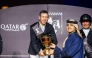 Chairman of the Board of Directors of Qatar Fund for Development H E Sheikh Thani bin Hamad Al Thani hands the trophy to Britain’s Scott Brash.