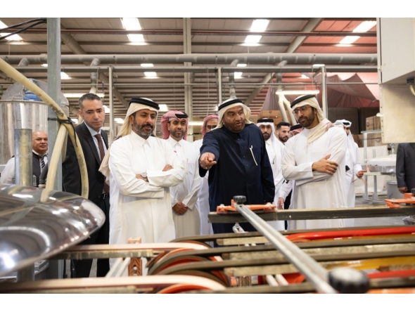 Minister of Commerce and Industry H E Sheikh Faisal bin Thani bin Faisal Al Thani touring one of the factories, yesterday.