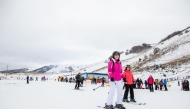 Tourists ski in the small ski resort of Roccaraso in the Abruzzo region, on January 18, 2026. Photo by Luca PRIZIA / AFP