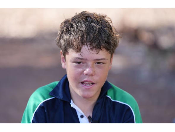 Austin tried to reach land on his kayak before it took on water in rough seas, then swam the rest of the way. (ABC News: Briana Shepherd)