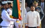 Sri Lanka's President Anura Kumara Dissanayake (front, R) arrives to hoist the national flag during the country's 78th Independence Day celebrations at Independence Square in Colombo on February 4, 2026. (Photo by Ishara S. KODIKARA / AFP)