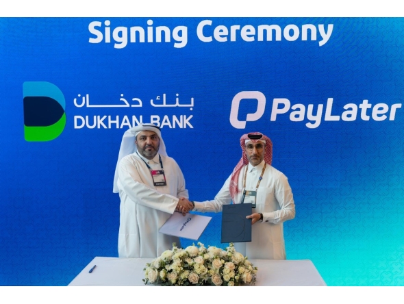 Dukhan Bank and PayLater officials during the signing ceremony.