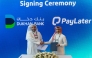 Dukhan Bank and PayLater officials during the signing ceremony.