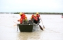 Civil defence rescuers ride in a boat on flood waters in the Sidi Kacem region, in northwestern morocco on February 5, 2026. (Photo by AFP)
