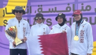 Team Qatar archers celebrate.