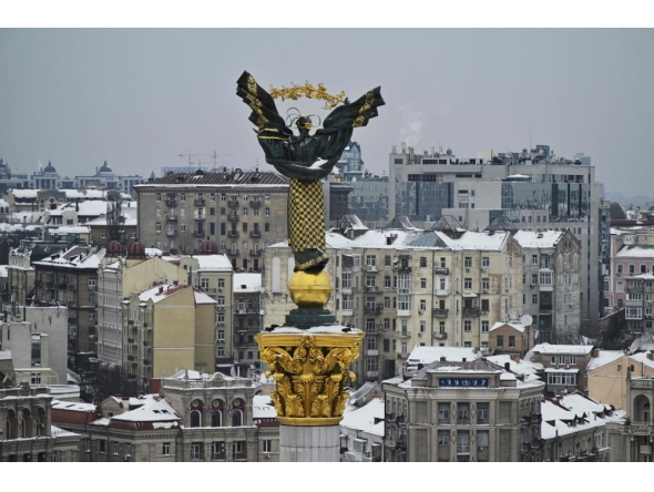 This photograph shows the Independence Monument towering over the Independence Square in Kyiv on February 6, 2026. (Photo by Genya Savilov / AFP)
