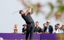 US golfer Patrick Reed plays a shot during the third day of the Qatar Masters at Doha Golf Club. 