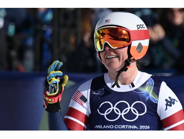 US' Breezy Johnson reacts in the finish area after competing in the women's downhill event during the Milano Cortina 2026 Winter Olympic Games. (Photo by Tiziana FABI / AFP)