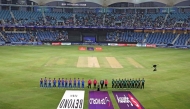 File photo: Indian and Pakistani players stand for their national anthem at the start of the Asia Cup 2025 Super Four Twenty20 international cricket match between India and Pakistan at the Dubai International Stadium in Dubai on September 21, 2025. (Photo by Fadel SENNA / AFP)