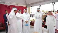 Chairman of the Alumni Association of Qatar University H E Sheikh Dr. Faleh bin Nasser Al Thani with other officials during the event.