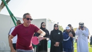 Undersecretary of the Ministry of Education and Higher Education Ibrahim bin Saleh Al Nuaimi participating in a game of table tennis at the event. 
