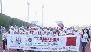 Rawabi officials, staff members and participants at the marathon.