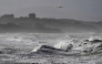 Waves crash near the Plage des Basques in Biarritz, as the storm named Nils hits southwestern France coastline on February 12, 2026. (Photo by Gaizka IROZ / AFP)