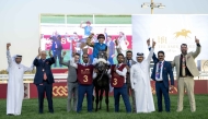 The connections of Lippo De Carrere celebrate after winning the H H The Amir Sword. PICS: JUHAIM/QREC