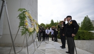 Representatives of retired veterans of the Singapore Armed Forces salute during a memorial ceremony to commemorate civilians who died during the Japanese occupation in World War II, in Singapore, Feb. 15, 2026. (Photo by Then Chih Wey/Xinhua)