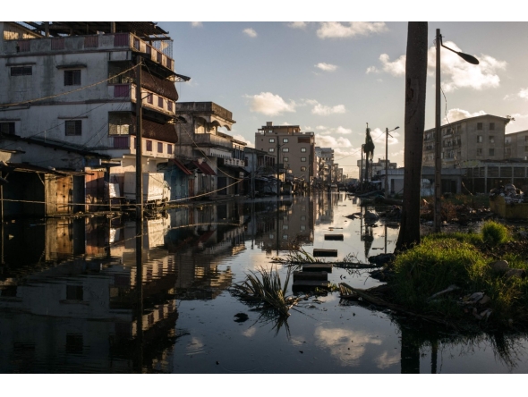 General view of a flooded street in Toamasina on February 15, 2026 after the passage of tropical cyclone Gezani. Photo by RIJASOLO / AFP