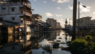 General view of a flooded street in Toamasina on February 15, 2026 after the passage of tropical cyclone Gezani. Photo by RIJASOLO / AFP