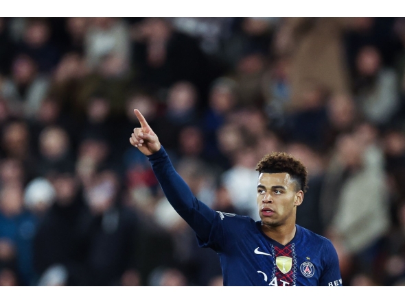 Paris Saint-Germain's French midfielder #14 Desire Doue celebrates scoring his team's third goal during the UEFA Champions League knockout round play-off first leg football match between AS Monaco and Paris Saint-Germain at the Stade Louis II in the Principality of Monaco on February 17, 2026. (Photo by Valery HACHE / AFP)