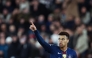 Paris Saint-Germain's French midfielder #14 Desire Doue celebrates scoring his team's third goal during the UEFA Champions League knockout round play-off first leg football match between AS Monaco and Paris Saint-Germain at the Stade Louis II in the Principality of Monaco on February 17, 2026. (Photo by Valery HACHE / AFP)