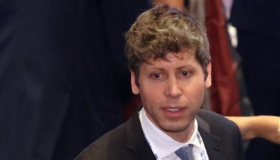 OpenAI CEO Sam Altman attends the AI Impact Summit in New Delhi on February 19, 2026. (Photo by Ludovic MARIN / AFP)