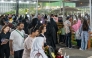 People visiting the exhibition at Katara. 