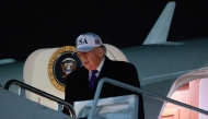 U.S. President Donald Trump steps off of Air Force One after returning to the nation's capital on February 19, 2026 at Joint Base Andrews, Maryland. Photo by CHIP SOMODEVILLA / GETTY IMAGES NORTH AMERICA / Getty Images via AFP