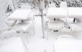 Snow covers chairs and tables of a cafe as winter strikes Vienna, Austria with snow and freezing temperatures on February 20, 2026. (Photo by Joe Klamar / AFP)