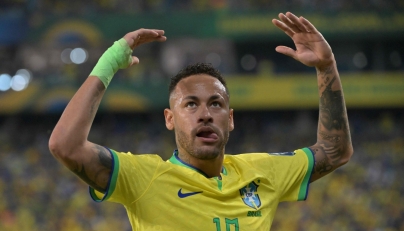 (FILES) Brazil's forward Neymar gestures during the 2026 FIFA World Cup South American qualification football match between Brazil and Venezuela at the Arena Pantanal stadium in Cuiaba, Mato Grosso State, Brazil, on October 12, 2023. (Photo by NELSON ALMEIDA / AFP)