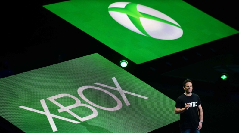 Head of Xbox, Phil Spencer, speaks at the Xbox media briefing where new games were introduced on the eve of the annual E3 video game extravaganza in Los Angeles, California on June 9, 2014. (Photo by Frederic Brown / AFP)