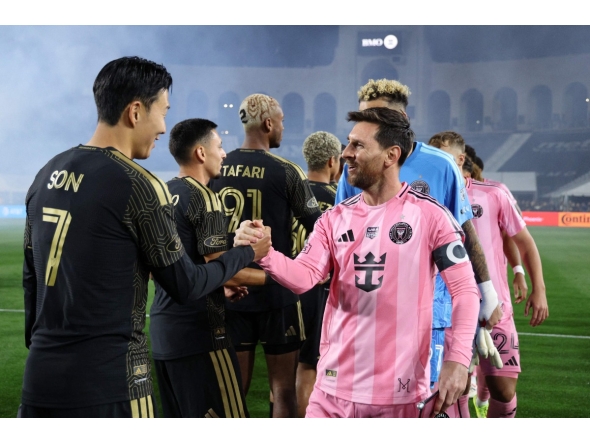 Lionel Messi #10 of Inter Miami CF. greets Son Heung-Min #7 of Los Angeles FC prior to the MLS match between Los Angeles Football Club and Inter Miami CF at Los Angeles Memorial Coliseum on February 21, 2026 in Los Angeles, California. Photo by KEVORK DJANSEZIAN / GETTY IMAGES NORTH AMERICA / Getty Images via AFP