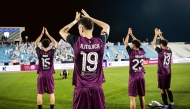 Al Sadd players acknowledge fans after their win over Al Wakrah. 
