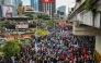 Protesters march during an anti-corruption rally that coincides with the 40th anniversary of the EDSA People Power Revolution, in Quezon City on February 25, 2026. (Photo by Jam Sta Rosa / AFP)