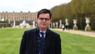 Head of the Chateau de Versailles domain, Christophe Leribault, poses for photographs, on the sidelines of a media tour of the Paris 2024 Olympic and Paralympic venue infrastructure in Versailles, southwest of Paris, on March 29, 2024. Photo by EMMANUEL DUNAND / AFP