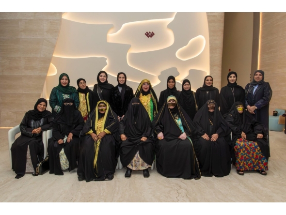 Minister of Social Development and Family H E Buthaina bint Ali Al Jabr Al Nuaimi with officials and members of Ehsan during the event.