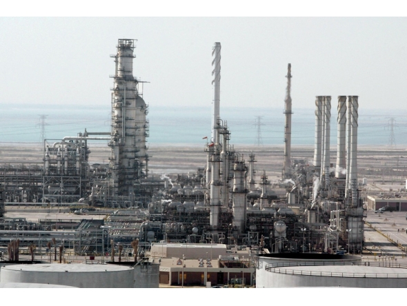 A general view shows Ras Tannura's oil production plant near Dammam in Saudi Arabia's eastern province, 27 December 2004. Photo by BILAL QABALAN / AFP