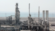 A general view shows Ras Tannura's oil production plant near Dammam in Saudi Arabia's eastern province, 27 December 2004. Photo by BILAL QABALAN / AFP