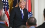 US President Donald Trump departs the stage after hosting a Medal of Honor ceremony in the East Room of the White House on March 2, 2026, in Washington, DC. (Photo by SAUL LOEB / AFP)