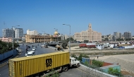 A truck troller is parked to block the road leading to the US Consulate in Karachi on March 2, 2026. Photo by Asif Hassan / AFP
