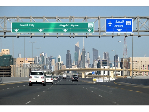 Vehicles drive along the highway leading to and from Kuwait City on March 2, 2026. Photo by YASSER AL-ZAYYAT / AFP