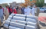Ambassador of Qatar to Sudan H E Mohamed bin Ibrahim Al-Sada with other officials at the distribution centre of shelter tents.