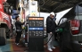 People fill up their cars at a petrol station in Seoul on March 9, 2026. Photo by JUNG YEON-JE / AFP