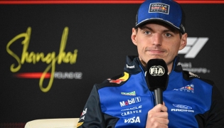 Red Bull Racing's Dutch driver Max Verstappen attends a press conference ahead of the Formula One Chinese Grand Prix at the Shanghai International Circuit in Shanghai on March 12, 2026. (Photo by Jade Gao / AFP)