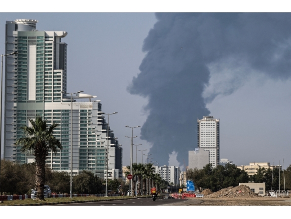 Smoke rises from the direction of an energy installation in the Gulf emirate of Fujairah on March 14, 2026. (Photo by AFP) 