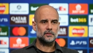 Manchester City's Spanish manager Pep Guardiola looks on during a press conference at the Etihad Campus training ground in Manchester, north-west England, on March 16, 2026, on the eve of their UEFA Champions League, Last 16, second-leg football match against Real Madrid. (Photo by Paul ELLIS / AFP)
