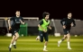 Al Sadd's Akram Afif (centre) trains with teammates.